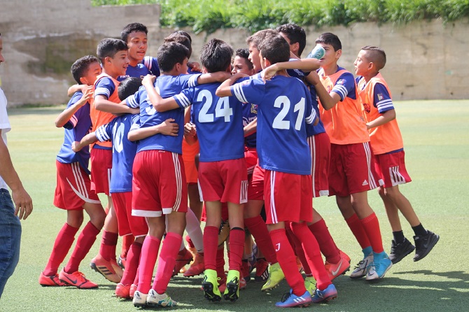 Foto_1_-_Celebración_Sub_13_vs_DLG.JPG
